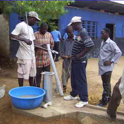 Working on the Hand Pump
