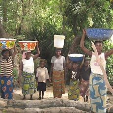 Villagers Walking to Draw Water